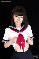 Raising uniform top over her waist