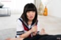Giving handjob on her knees in uniform