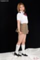 Kogal in uniform wearing plaid skirt white socks