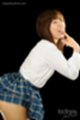 Leaning forward uniform skirt raised