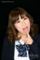 Finger raised to her tongue