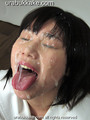 Eyes closed tongue extended thick cum covering her face.jpg