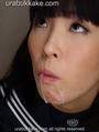 Momoha with cum running from her lips down over her chin.jpg