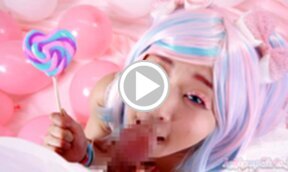 Minano Ai on her knees licking lollipop and sucking cock