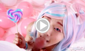 Minano Ai on her knees licking lollipop and sucking cock